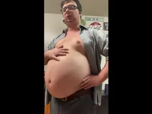 Beer bloat in tight button up and tie